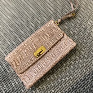 Prada blush clutch with gold clasp